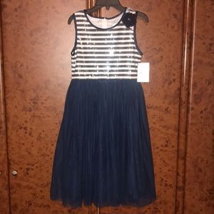 Girls party dress by Dorissa.